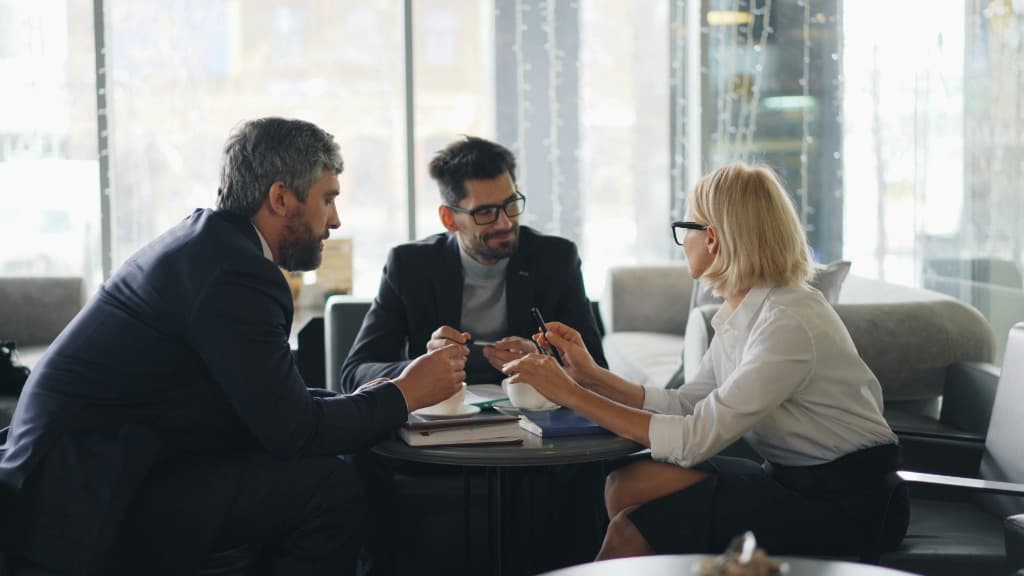 Business executives collaborating in a premium setting